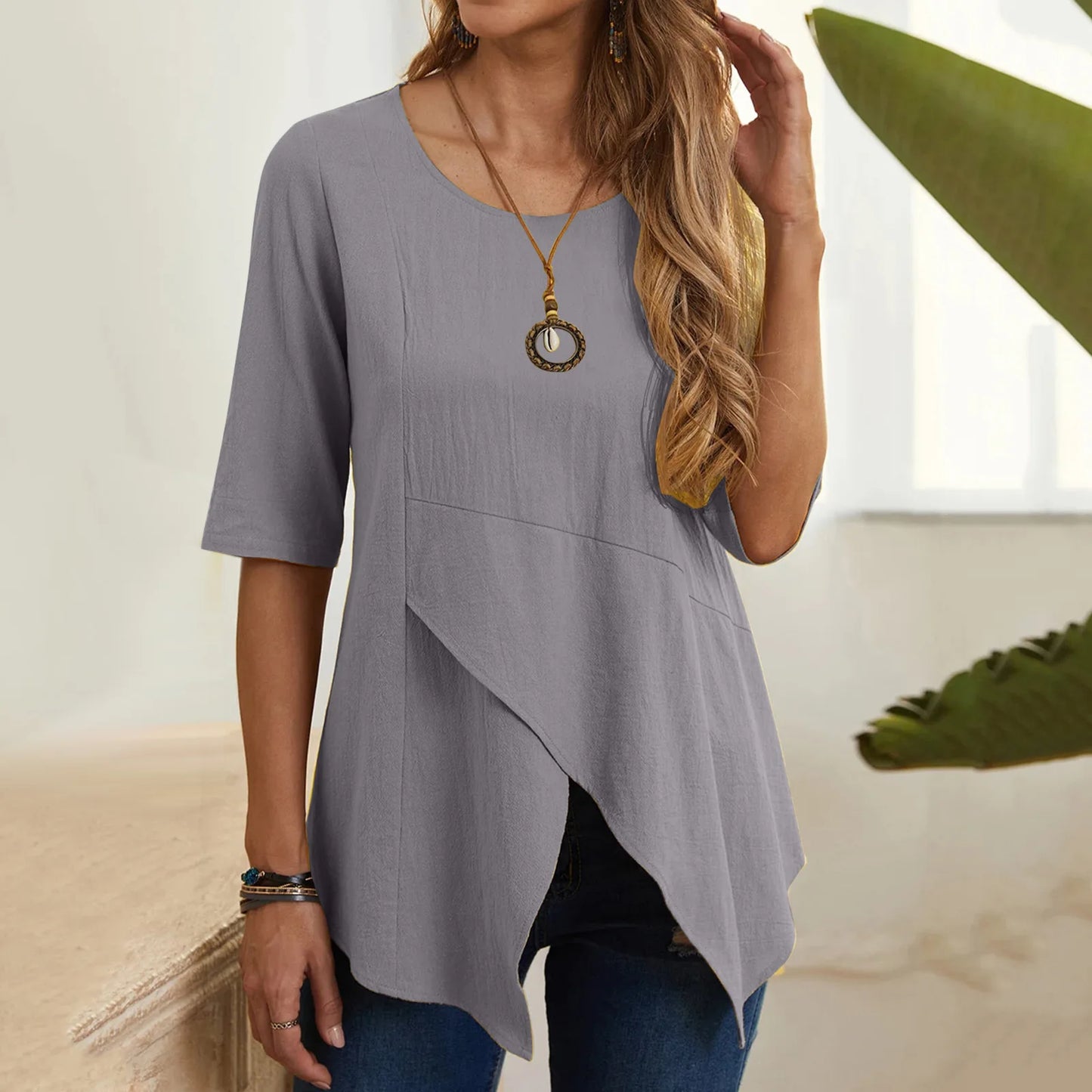 New women's clothing with fashionable temperament, casual commuting elegance, irregular slimming, mid sleeves, cotton and linen